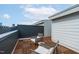 Relaxing rooftop deck featuring wooden flooring and comfortable seating with skyline views at 10 Seawell Ave # 102, Raleigh, NC 27601