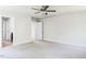 Spacious bedroom featuring neutral walls, soft carpet, and a modern ceiling fan for ultimate comfort at 266 Fast Pitch Ln, Four Oaks, NC 27524