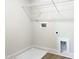 Laundry room with wire shelving and hookups for washer and dryer at 266 Fast Pitch Ln, Four Oaks, NC 27524