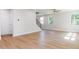 Open concept living area featuring hardwood floors and a staircase at 266 Fast Pitch Ln, Four Oaks, NC 27524
