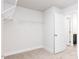 Spacious walk-in closet with shelving ready for organization at 266 Fast Pitch Ln, Four Oaks, NC 27524
