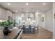 Kitchen featuring stainless steel appliances, center island with seating, and ample counter space at 52 Macy Cir, Wendell, NC 27591