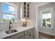 Bright kitchen with ample counter space, stainless steel sink, and stylish fixtures at 52 Macy Cir, Wendell, NC 27591