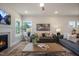 Inviting living room with a fireplace, neutral decor, and stylish furnishings at 52 Macy Cir, Wendell, NC 27591