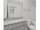 Bathroom vanity with gray cabinets, granite countertop, undermount sink, and chrome faucet at 951 Alma Railway Dr # 561, Wake Forest, NC 27587