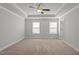 Large bedroom has neutral walls, carpet, and a ceiling fan at 951 Alma Railway Dr # 561, Wake Forest, NC 27587