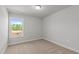 Neutral bedroom with carpet, window, and a view of the outdoors at 951 Alma Railway Dr # 561, Wake Forest, NC 27587