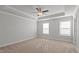 Spacious bedroom featuring a ceiling fan and two windows at 951 Alma Railway Dr # 561, Wake Forest, NC 27587