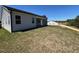 Spacious backyard with a large lawn, perfect for outdoor activities and gatherings at 96 Little Creek Dr, Lillington, NC 27546