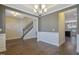 Spacious dining room with hardwood floors and modern lighting fixtures at 98 Valley Brook Ln, Spring Lake, NC 28390