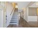 Open foyer with hardwood floors and staircase leading to the upper level at 98 Valley Brook Ln, Spring Lake, NC 28390