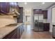 Modern kitchen with stainless steel appliances and granite countertops, perfect for cooking at 98 Valley Brook Ln, Spring Lake, NC 28390