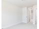 Bright bedroom features neutral walls, carpet floors, and access to other rooms at 305 Little Creek Dr, Lillington, NC 27546