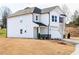 Lovely two-story home showcasing a 2-car garage, front entryway, and fresh landscaping at 305 Little Creek Dr, Lillington, NC 27546