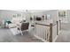 Comfortable living room featuring large windows, sofa, chairs, and TV at 34 Macy Cir, Wendell, NC 27591