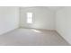 Bedroom with carpet and a window at 624 Gainer Dr # 17, Raleigh, NC 27610