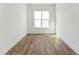 Cozy room with hardwood flooring, trim and a window, perfect for relaxing or working at 624 Gainer Dr # 17, Raleigh, NC 27610