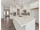 Beautiful kitchen with stone countertops, stainless steel appliances, and a large kitchen island at 624 Gainer Dr # 17, Raleigh, NC 27610