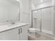Bathroom featuring single sink vanity and tiled shower at 205 Mugby Rd # 173, Raleigh, NC 27610