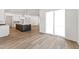 Open concept kitchen with island seating and a modern design that seamlessly connects to the living area at 205 Mugby Rd # 173, Raleigh, NC 27610