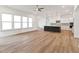 Open-concept kitchen with an island, modern appliances, and a seamless transition to the living area at 205 Mugby Rd # 173, Raleigh, NC 27610