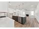 Modern kitchen featuring a center island, stainless steel appliances, and an open floor plan at 205 Mugby Rd # 173, Raleigh, NC 27610