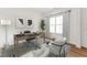Bright home office with a modern desk, comfortable seating, large windows, and stylish decor at 205 Mugby Rd # 173, Raleigh, NC 27610