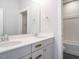 Modern bathroom with double sink vanity and separate shower room at 100 Mossy Falls Way, Wendell, NC 27591