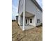 Covered patio offers an outdoor living space perfect for relaxing or entertaining guests at 216 Bruce Dr, Dunn, NC 28334
