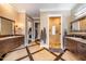 Main bathroom with double vanity and walk-in shower at 105 Creech Cir, Four Oaks, NC 27524