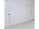 Bedroom featuring soft carpeting, fresh neutral paint, and two closets at 1253 Barreto Dr, Wendell, NC 27591