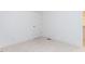 Bedroom featuring soft carpeting, fresh neutral paint, and an adjacent closet at 1253 Barreto Dr, Wendell, NC 27591