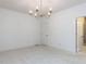 Carpeted bedroom with modern lighting and ensuite bathroom at 1253 Barreto Dr, Wendell, NC 27591