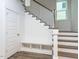 Functional entryway with a staircase, built-in bench, and closet for storage at 1253 Barreto Dr, Wendell, NC 27591