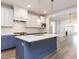 Stylish kitchen with an island, stainless steel appliances, and ample counter space at 1253 Barreto Dr, Wendell, NC 27591