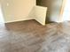 View of a living room featuring neutral walls and carpeted floors at 158 Citizens Ct # 32, Four Oaks, NC 27524
