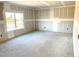 Unfinished bedroom with large windows and potential for personalization at 228 Olivia Crossing Ct # 8, Four Oaks, NC 27524