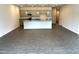 Open concept kitchen featuring gray cabinets, granite countertops, and stainless steel appliances at 346 Olivia Crossing Ct # 12, Four Oaks, NC 27524