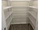Spacious walk-in closet with white wire shelving at 346 Olivia Crossing Ct # 12, Four Oaks, NC 27524