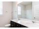 Bathroom with a double sink vanity and a large mirror at 490 Barbour Farm Ln, Four Oaks, NC 27524