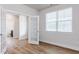 Bright bedroom with ensuite bathroom showcasing lots of natural light at 490 Barbour Farm Ln, Four Oaks, NC 27524