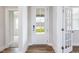 Inviting foyer showcasing a front door and natural light at 490 Barbour Farm Ln, Four Oaks, NC 27524