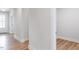 Hallway featuring wood flooring, and access to the exterior at 490 Barbour Farm Ln, Four Oaks, NC 27524