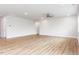 Open living room featuring recessed lighting, a ceiling fan, and elegant wood-look flooring at 490 Barbour Farm Ln, Four Oaks, NC 27524