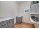 Walk-in pantry featuring built-in shelves, shaker cabinets, and a granite countertop at 736 Golfers View Vw, Pittsboro, NC 27312