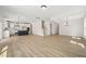 Open floor plan with a seamless connection between the kitchen and living spaces at 1228 Cricket St, Elon, NC 27244