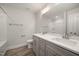 Stylish bathroom features double vanity, a large mirror, and sleek fixtures at 1232 Cricket St, Elon, NC 27244