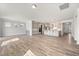 Spacious open concept kitchen featuring stainless appliances, a large island, and modern gray cabinetry at 1232 Cricket St, Elon, NC 27244