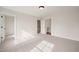 Bright bedroom with neutral carpet, white trim and interior doors plus ample closet space at 1301 Cricket St, Elon, NC 27244