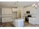 Contemporary kitchen featuring white cabinets, stainless steel appliances, and granite countertops at 59 Mossy Bridge Ct, Lillington, NC 27546